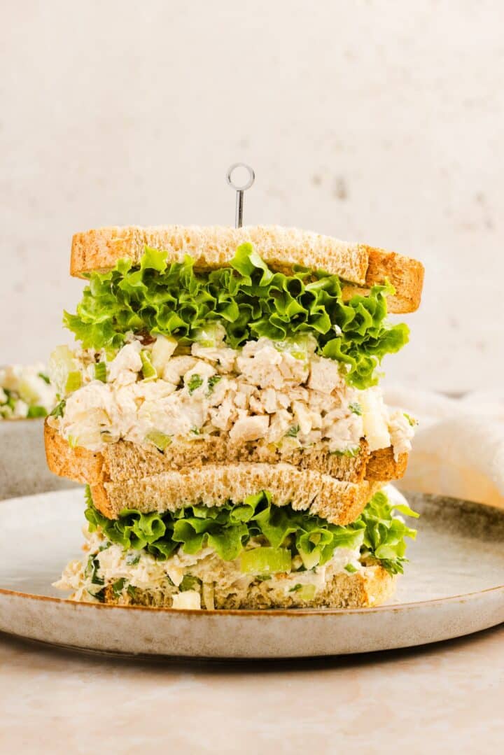 Rotisserie chicken salad on grain bread with garden salad