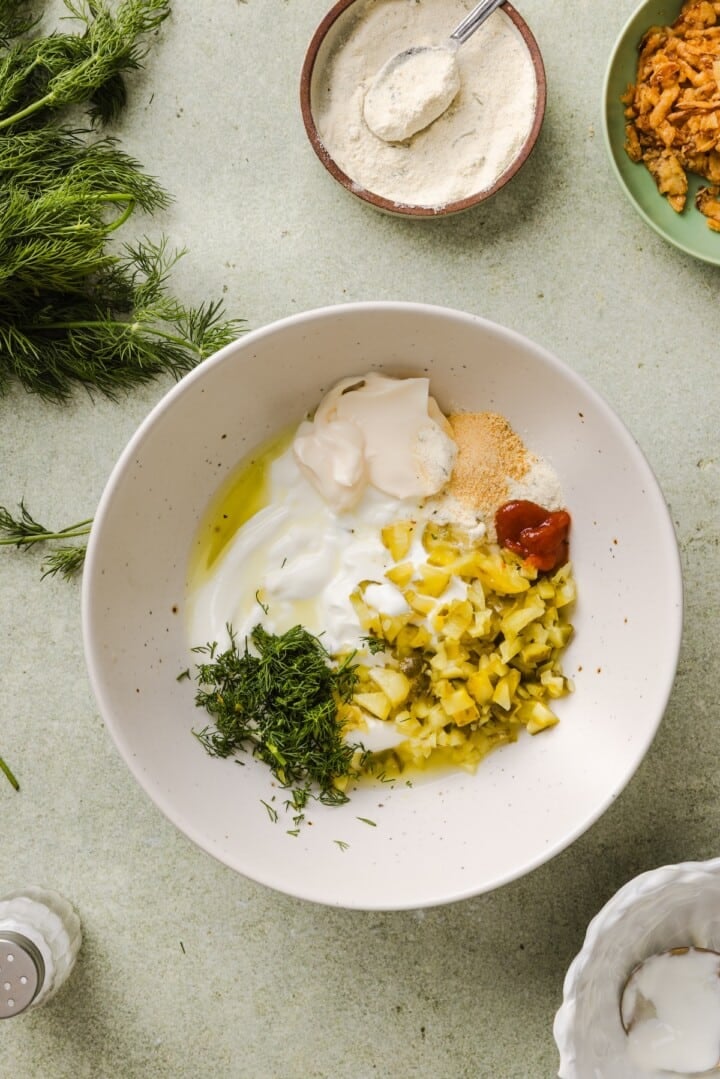 Protein fried pickle ingredients in a mixing bowl.