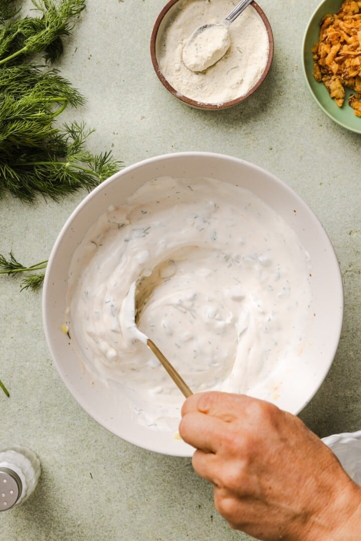 Protein fried pickle dip mixed in a bowl.