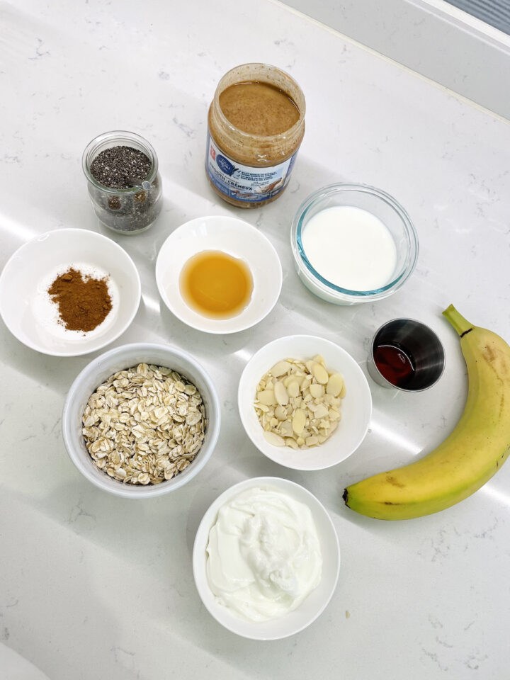 ingredients for almond butter overnight oats displayed on counter