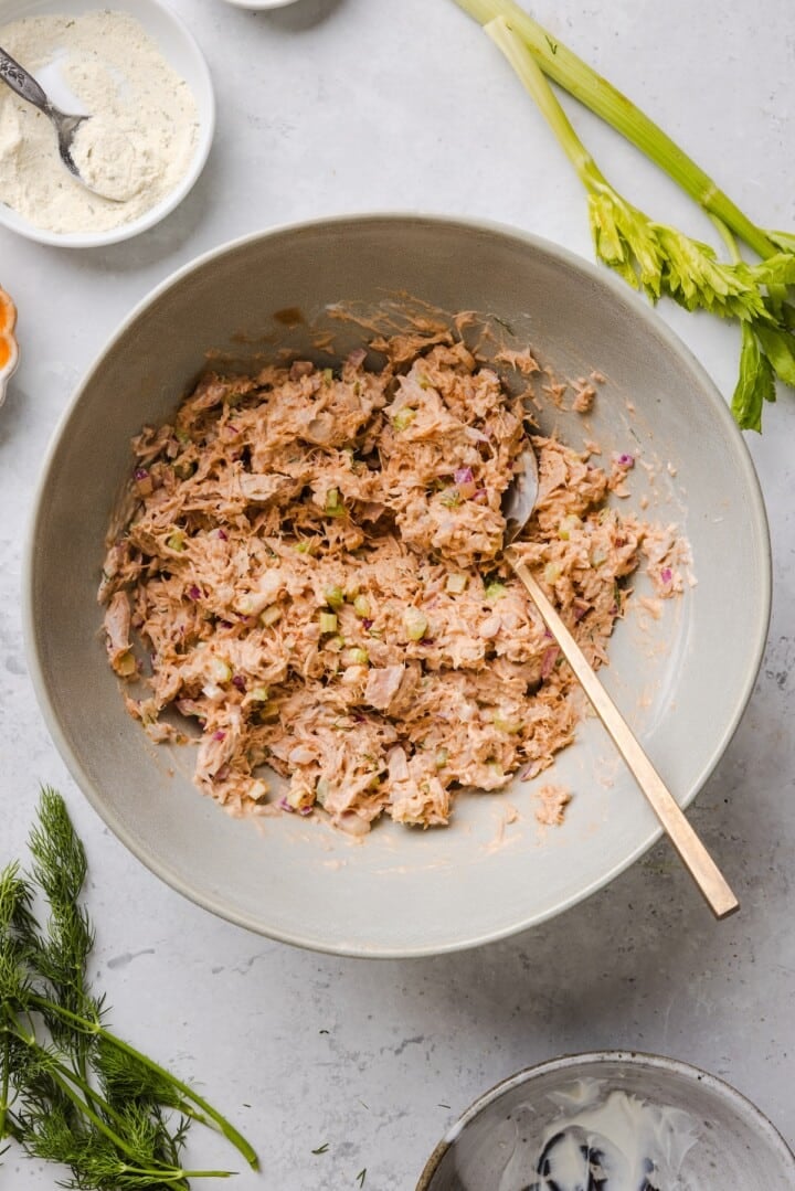 buffalo tuna salad in a white mixing bowl.