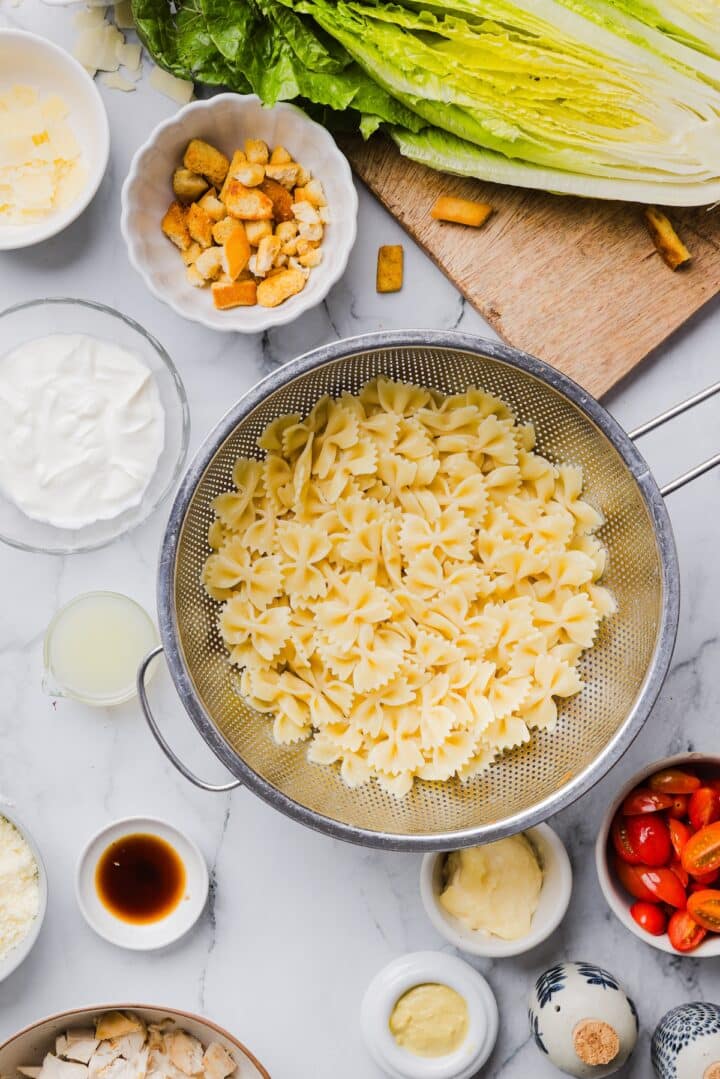 Cooked and drained farfalle pasta in a pot.