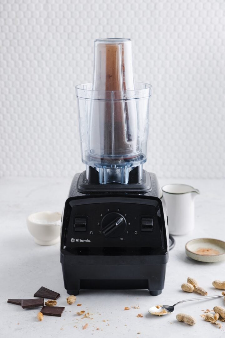 Chocolate peanut butter smoothie in a blender cup.