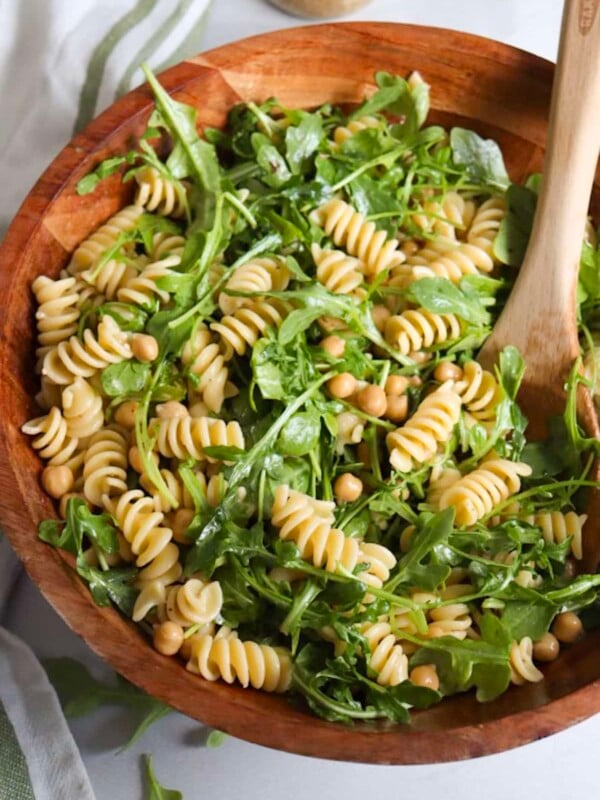 4 ingredient pasta salad with pasta, chickpeas, arugula, and greek vinaigrette