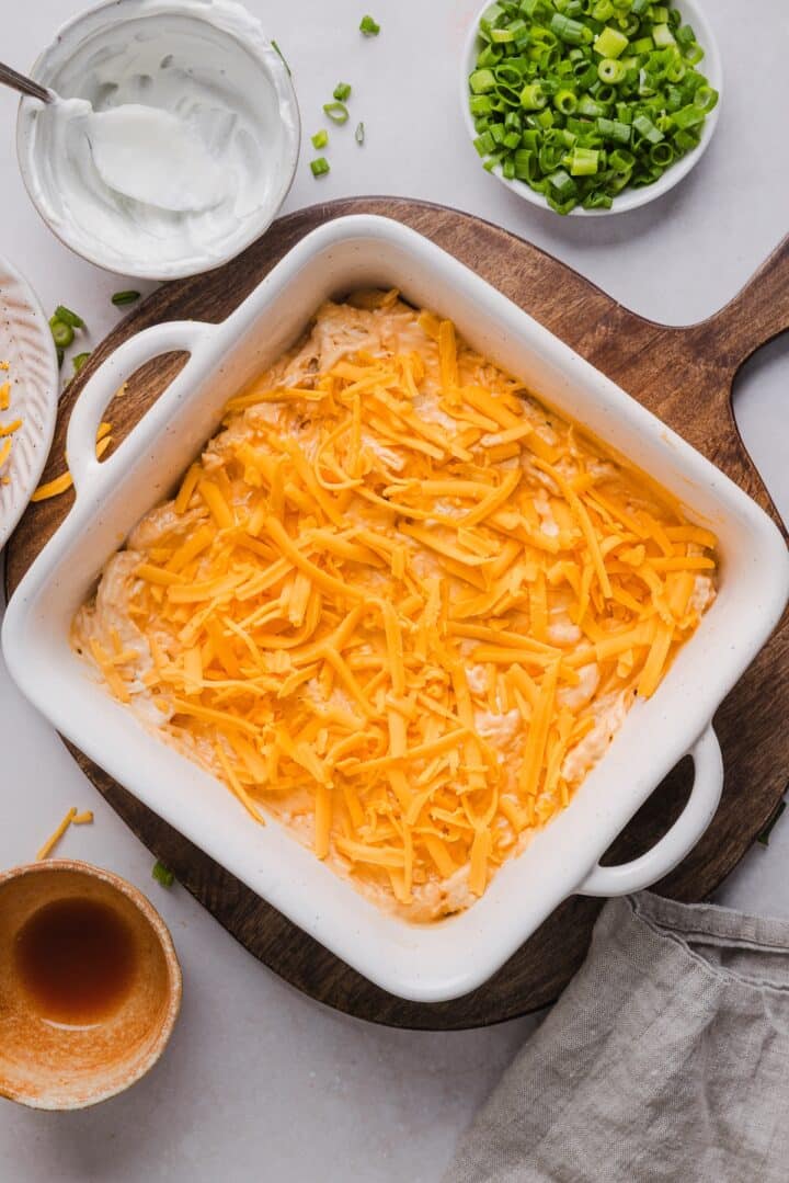 Cottage cheese buffalo chicken dip in a baking dish, before baking.