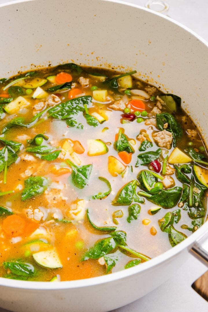 Large pot with ground turkey vegetable soup inside