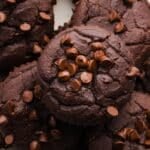 Close-up and overhead photo of brownie black bean muffins piled on a white plate