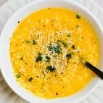 Overhead photo of Italian penicillin soup in a white bowl
