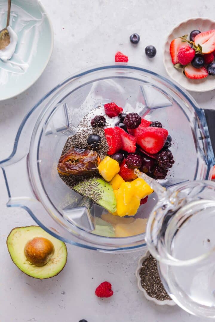 Smoothie ingredients in a blender.