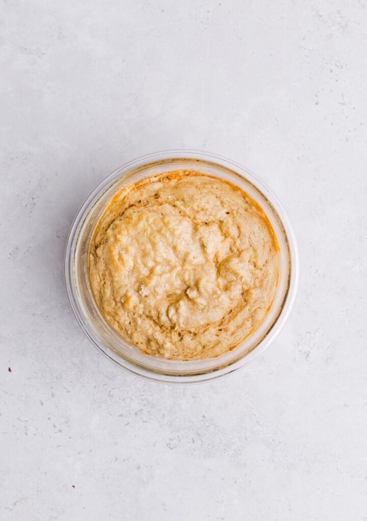 Cooked protein pancake bowl in a glass container