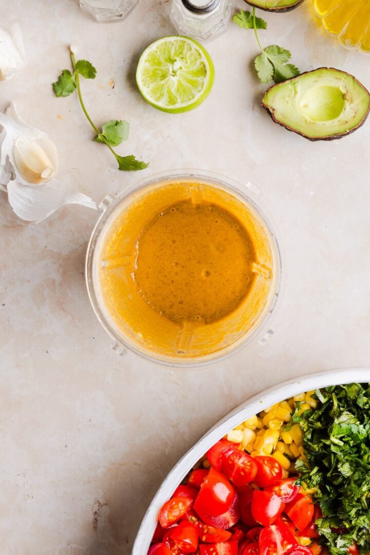 Dressing for couscous cowboy caviar salad in a blender cup