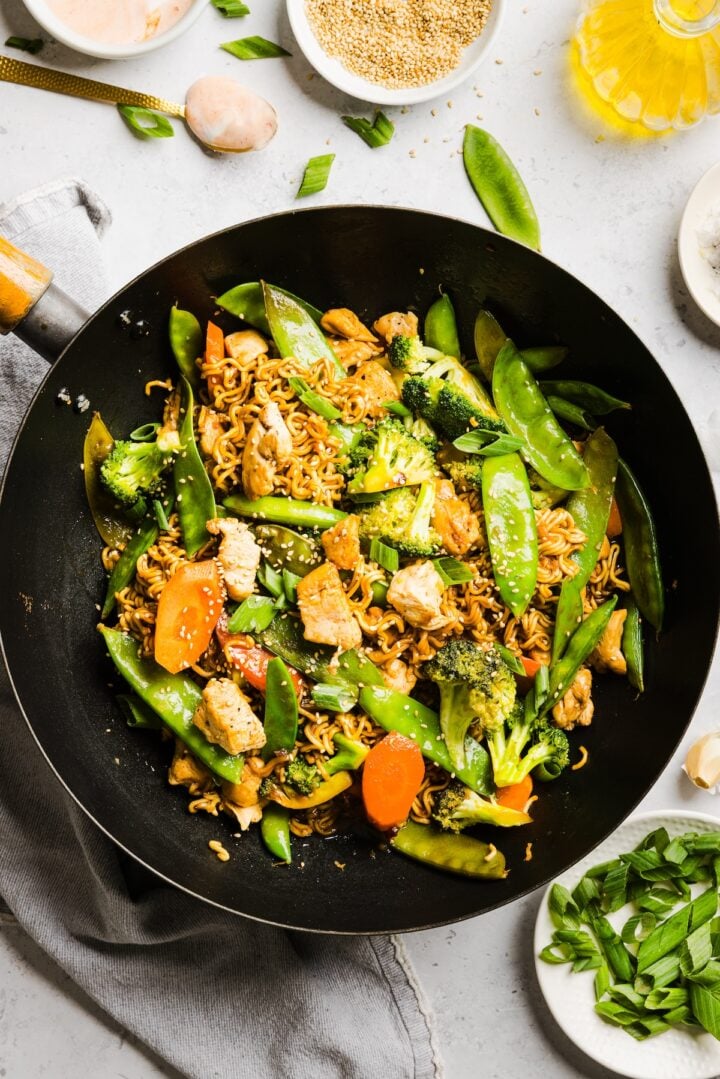 Wok filled with chicken and vegetable teriyaki stir fry