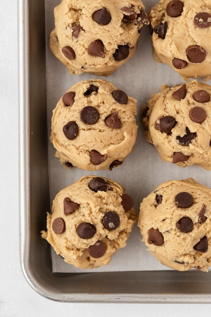 Giant cookie dough balls with milk and semi-sweet chocolate chips