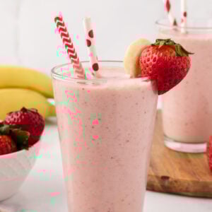 Two glasses filled with strawberry banana smoothie without yogurt