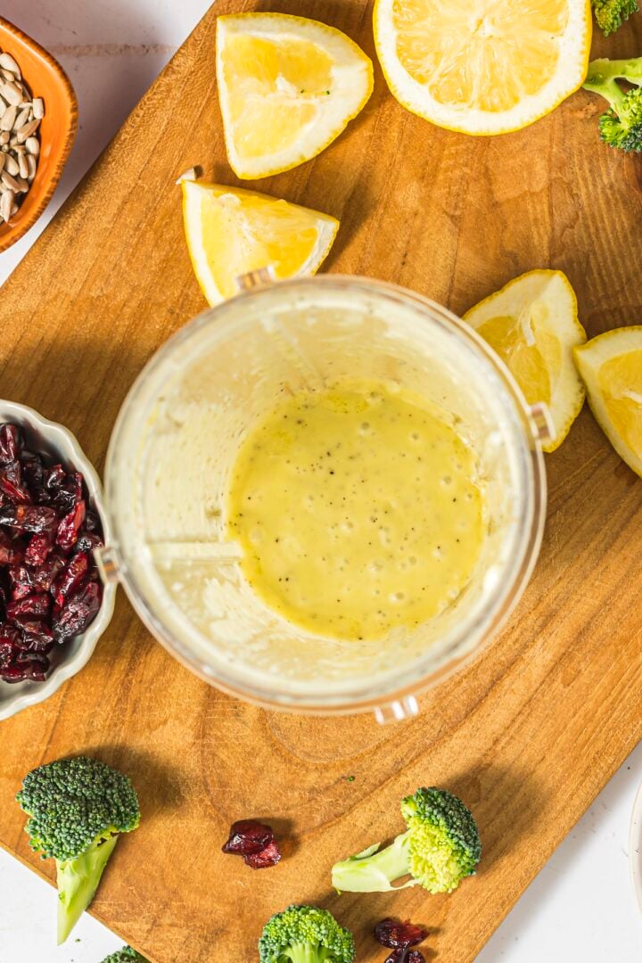 Honey lemon vinaigrette blended in a small blender cup