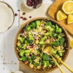 Overhead shot of broccoli crunch salad in a large mixing bowl
