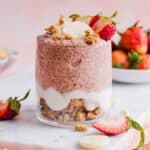 one glass jar containing strawberry banana chia pudding
