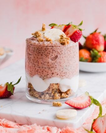 one glass jar containing strawberry banana chia pudding