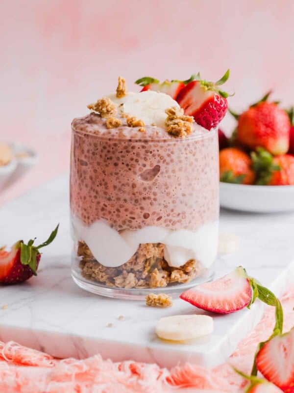 one glass jar containing strawberry banana chia pudding