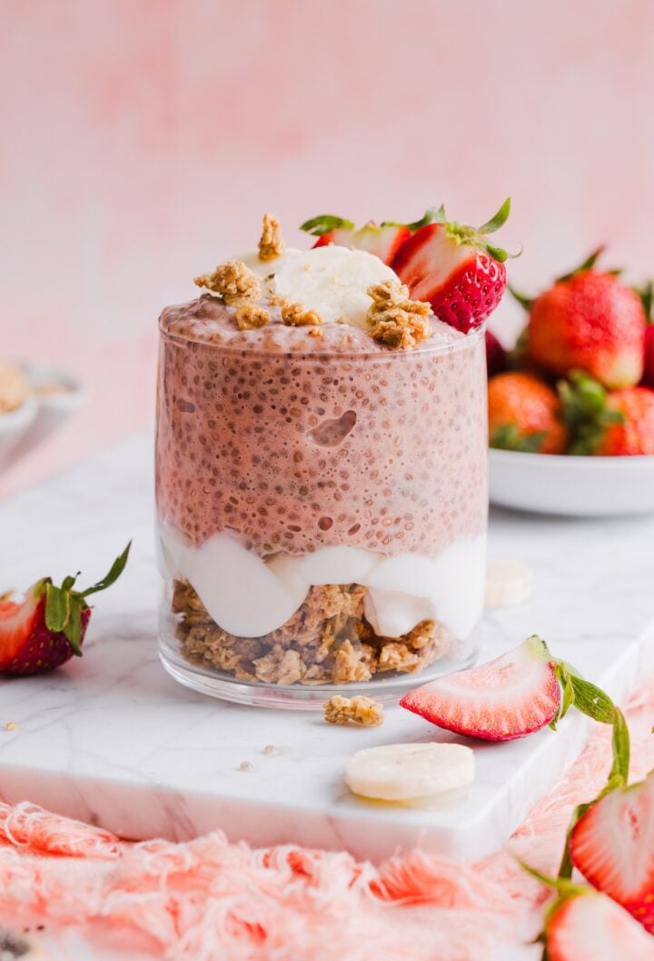 one glass jar containing strawberry banana chia pudding