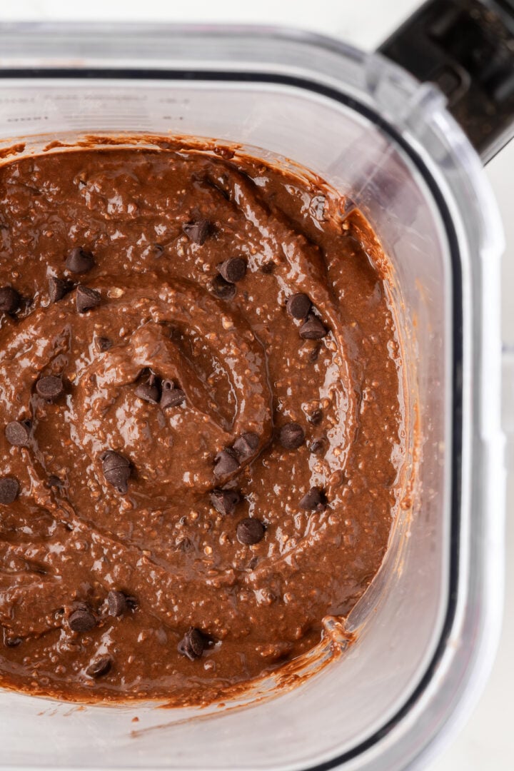 Chocolate chips stirred into muffin batter for chocolate banana muffins.