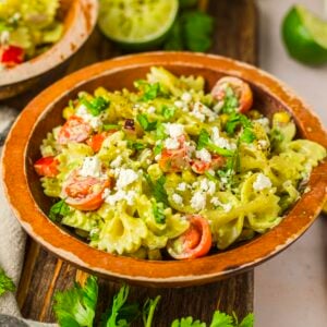 Cilantro lime pasta salad in a wood serving bowl.