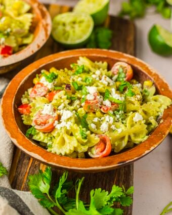 Cilantro lime pasta salad in a wood serving bowl.