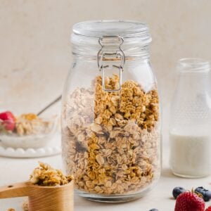 Peanut butter granola in a large glass jar.