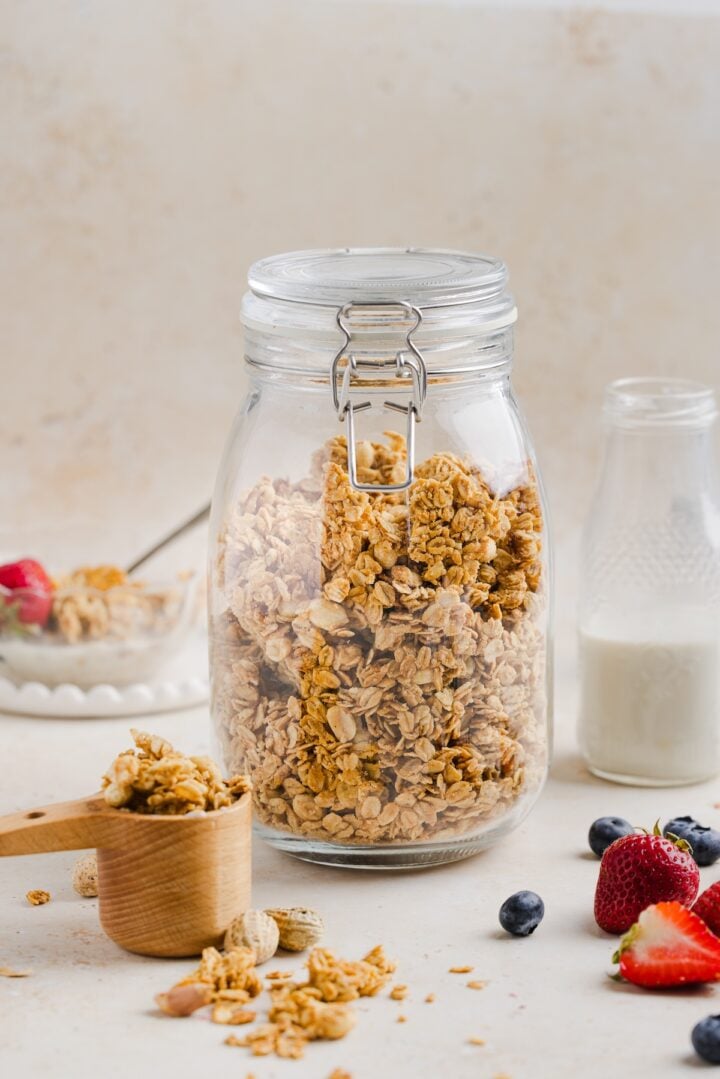 Peanut butter granola in a large glass jar.