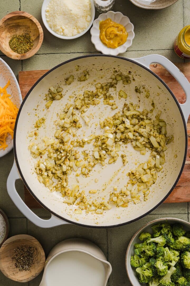 Onions and seasonings cooked in a braiser pan.