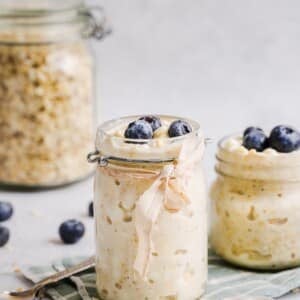 Cottage cheese overnight oats in a glass jar.