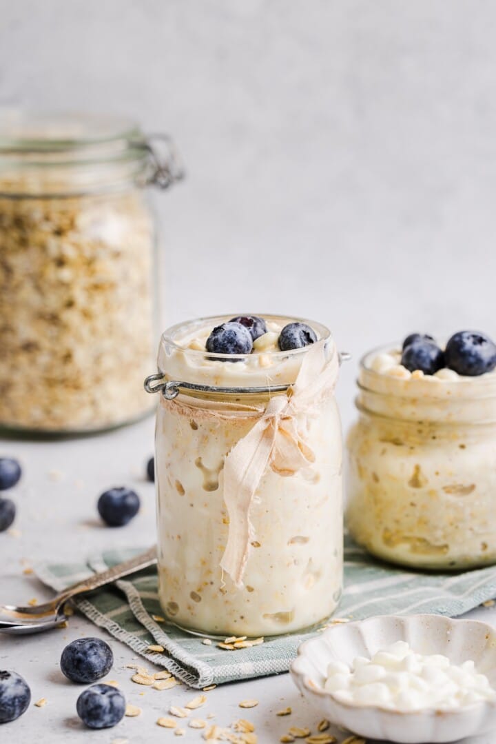 Cottage cheese overnight oats in a glass jar.