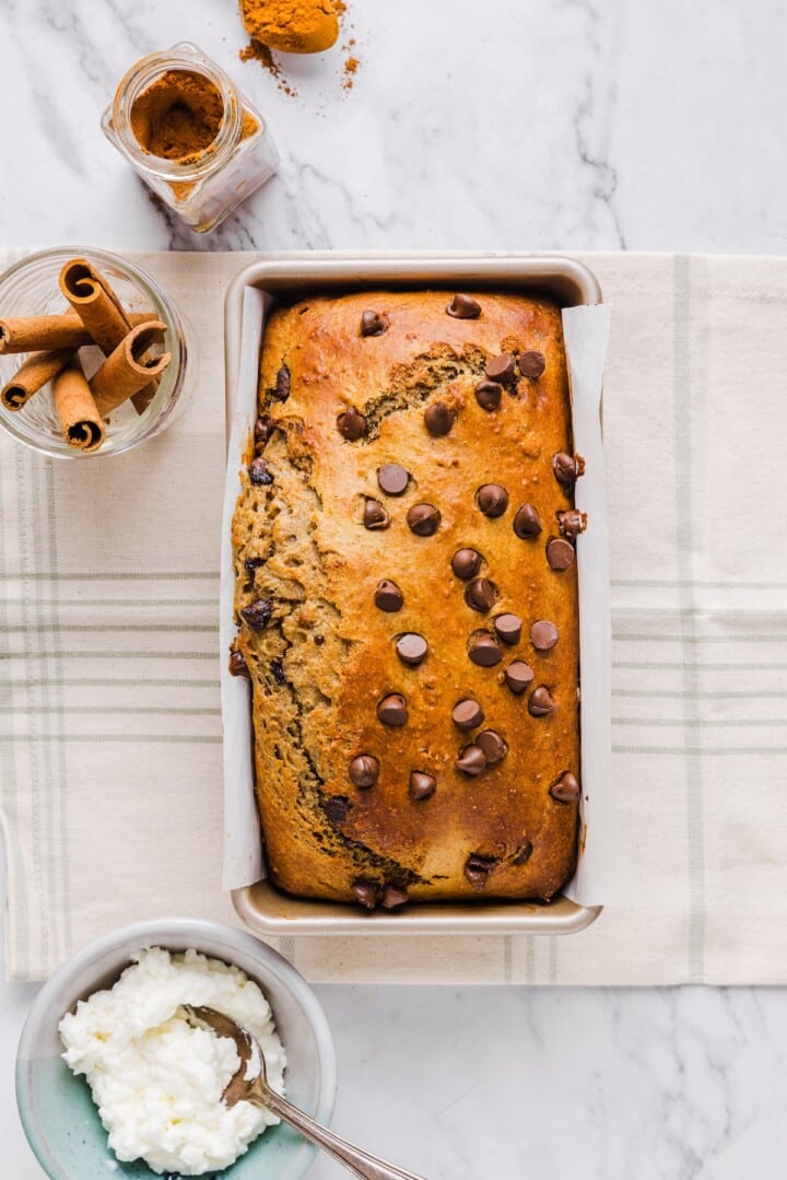 Loaf of cottage cheese banana bread baked in a loaf pan.