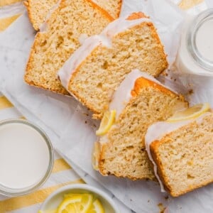 Slices of Starbucks copycat lemon loaf on a marble countertop.