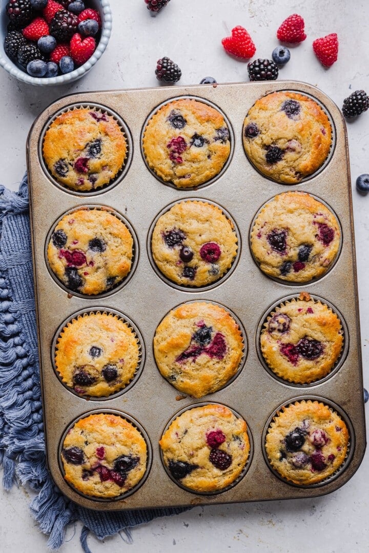 Protein pancake muffins made from Kodiak mix baked and cooling in a muffin pan.