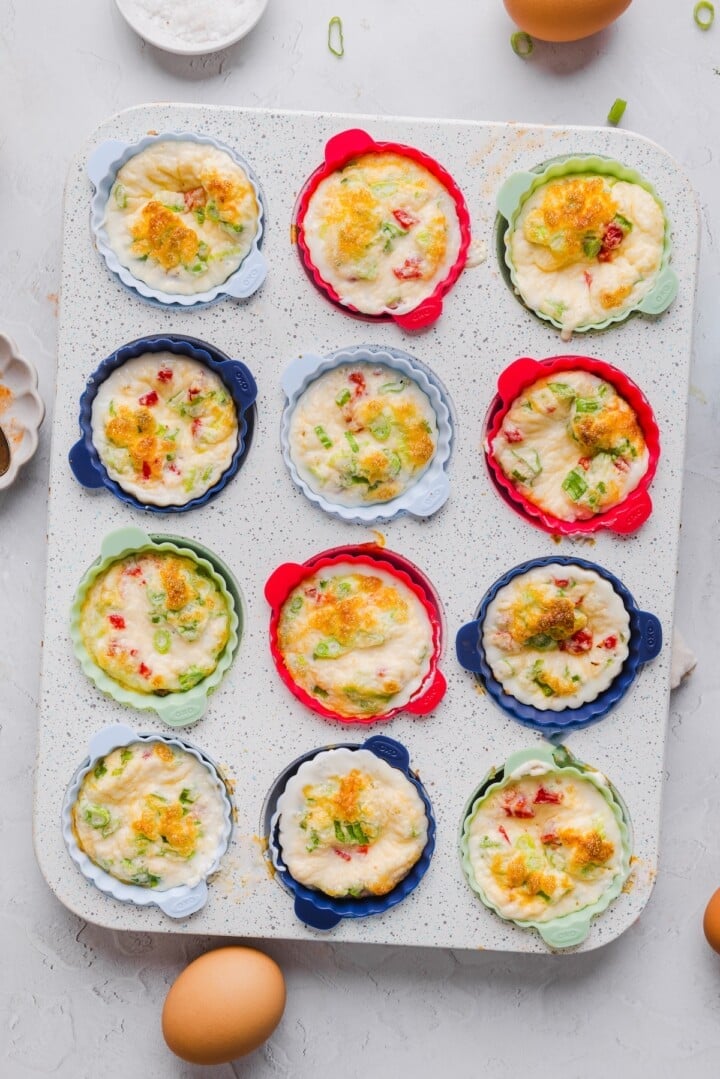 Baked egg white bites in silicone liners.