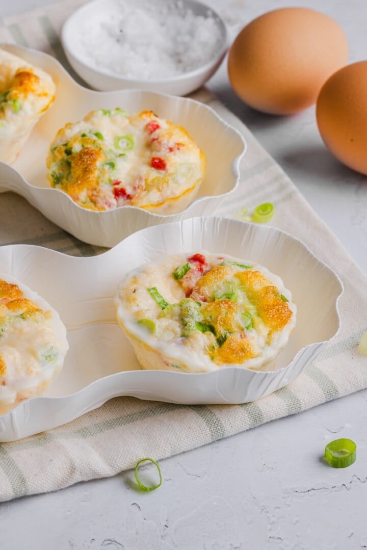 Starbucks egg whites bites in white cardboard carriers.