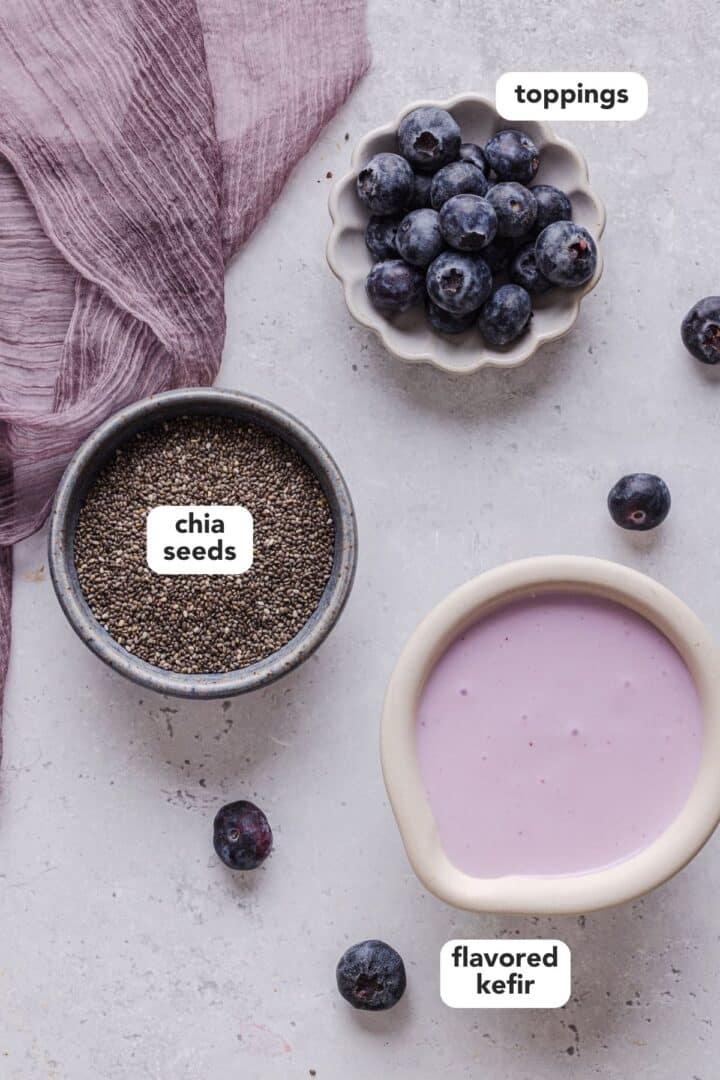 Ingredients for chia pudding including toppings, chia seeds and flavored kefir.