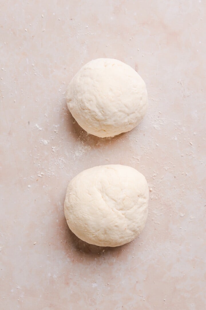 Two dough balls for cottage cheese pizza buns.