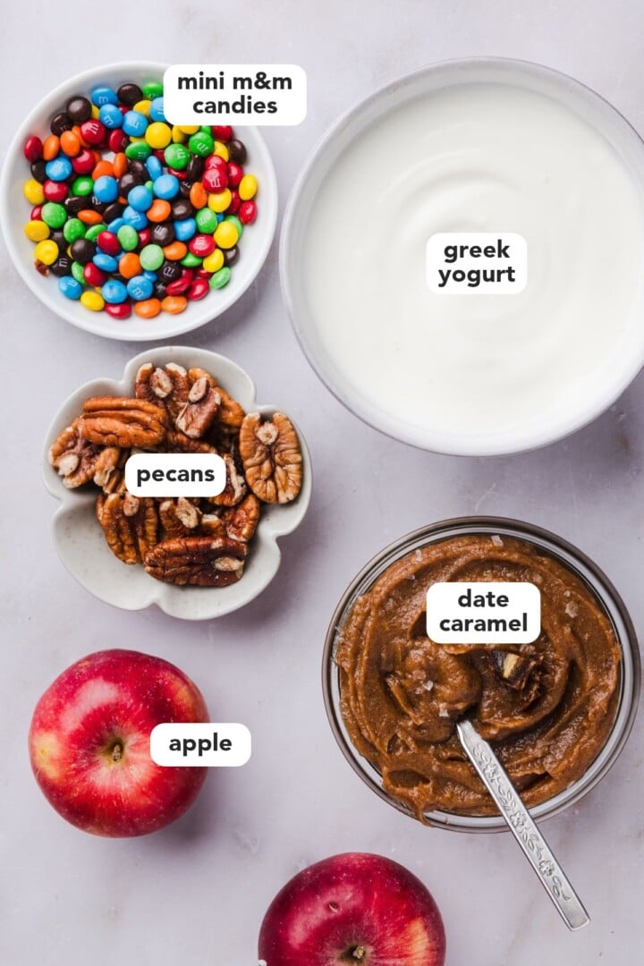 Ingredients for caramel apple jars in bowls.