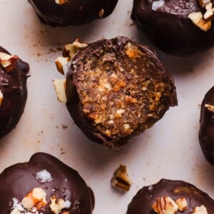 Pecan pie energy bites coated in chocolate.