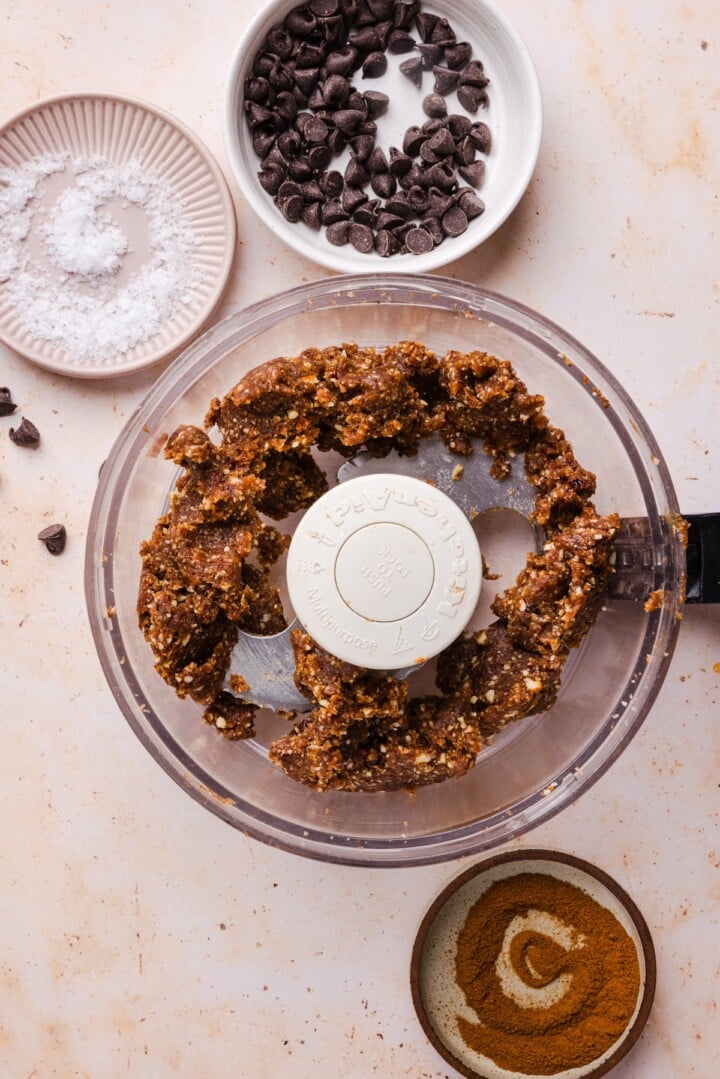 Pecans and dates pulsed together in food processor.